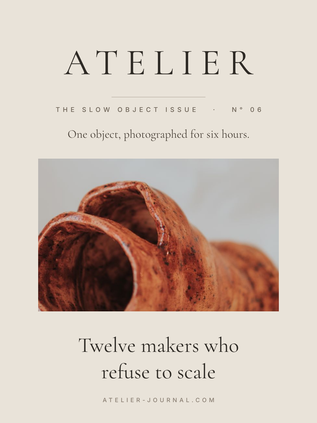 Minimal magazine cover with a thin serif masthead and a small photo window