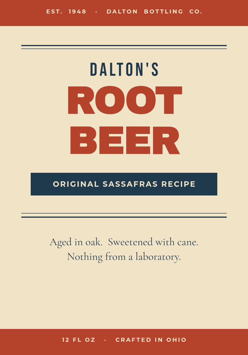 Rótulo de root beer creme com faixas ferrugem em cima e em baixo e ROOT BEER em maiúsculas pesadas